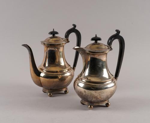 A SILVER TWO PIECE CAFE AU LAIT SET