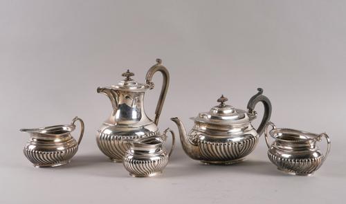 A SILVER MATCHED FIVE PIECE TEA SET (5)