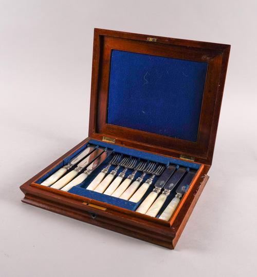 TWELVE SILVER BLADED DESSERT KNIVES AND FORKS (12)