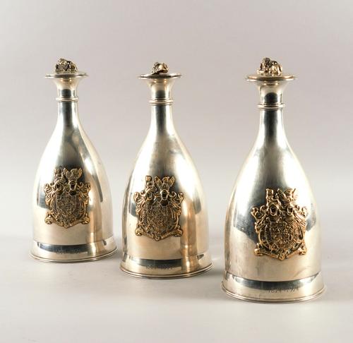 THREE SILVER BOTTLE DECANTERS (3)