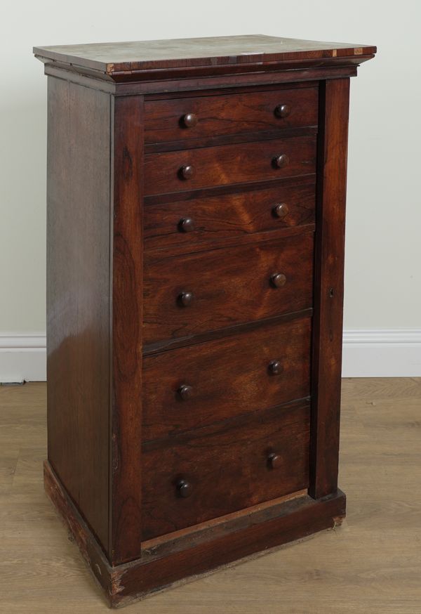 A VICTORIAN ROSEWOOD SECRETAIRE FIVE DRAWER WELLINGTON CHEST