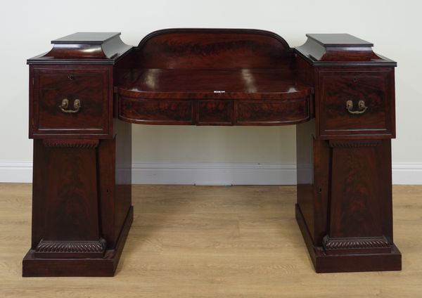 A GEORGE IV MAHOGANY PEDESTAL SIDEBOARD