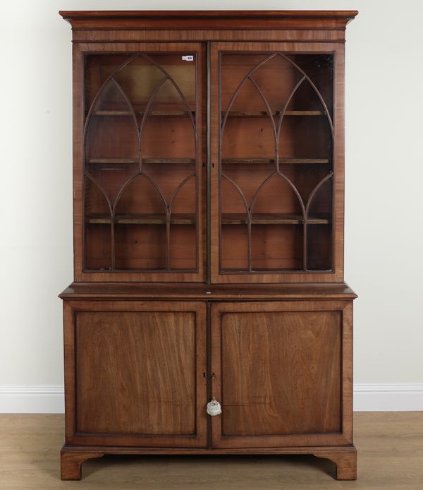 A GEORGE III MAHOGANY BOOKCASE CABINET