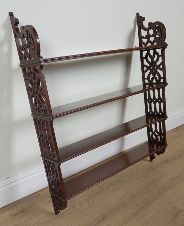 A LATE VICTORIAN MAHOGANY FOUR TIER HANGING SHELF