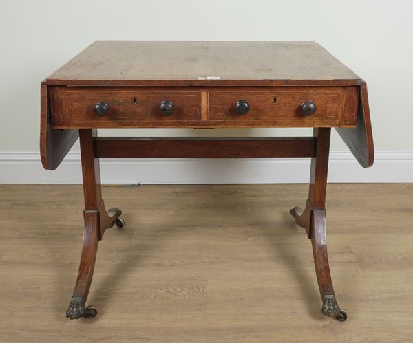 A REGENCY SATINWOOD BANDED ROSEWOOD SOFA TABLE