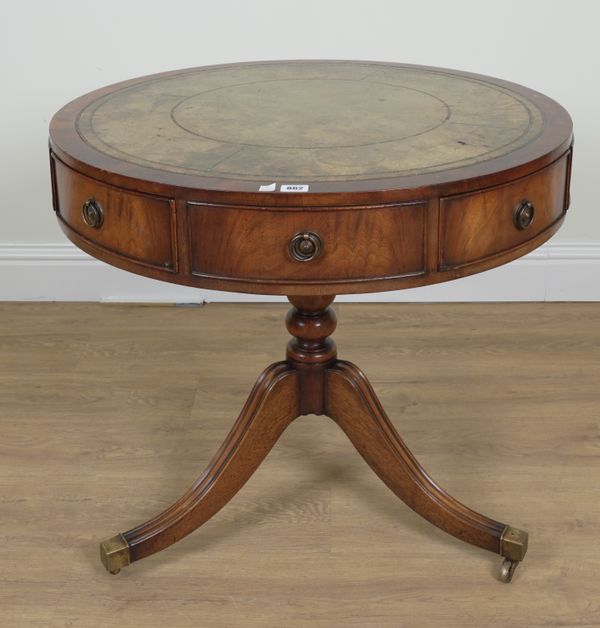 A REGENCY STYLE MAHOGANY DRUM TABLE