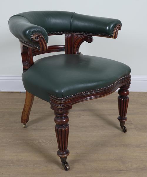 AN EARLY VICTORIAN MAHOGANY TUB BACK DESK ARMCHAIR
