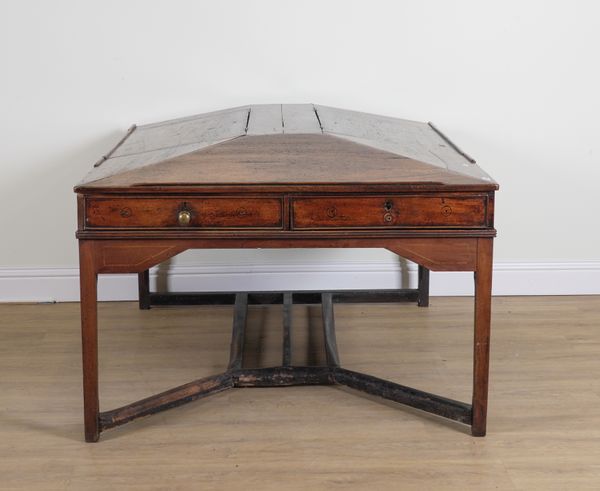 AN UNUSUAL GEORGE III MAHOGANY PARTNERS CLERKS DESK