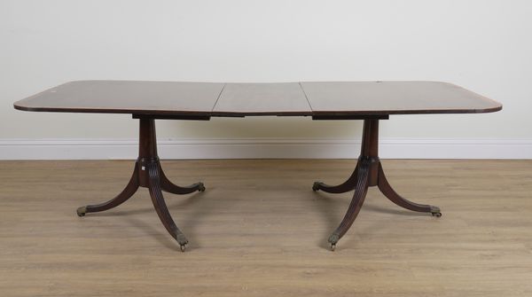 A 19TH CENTURY AND LATER INLAID MAHOGANY TWIN PILLAR EXTENDING DINING TABLE