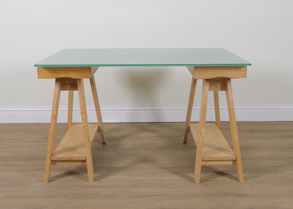 A MODERN RECTANGULAR GLASS TOPPED DESK