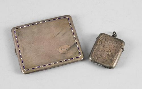 A VICTORIAN SILVER VESTA CASE AND A FOREIGN CIGARETTE CASE (2)