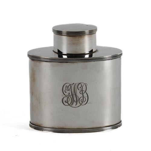 A SILVER OVAL TEA CADDY