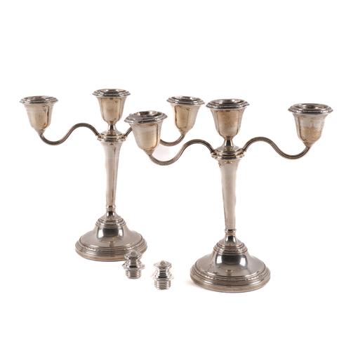 A PAIR OF SILVER THREE LIGHT TABLE CANDELABRA , WITH TWO SCREW DOWN FINIALS (4)