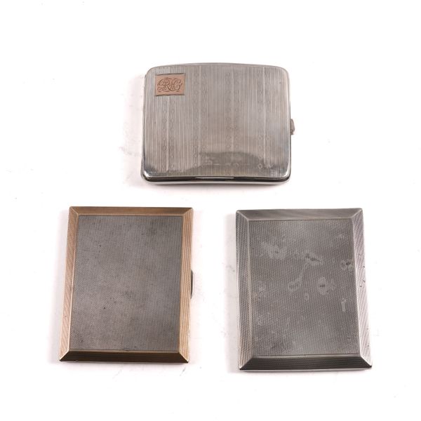 THREE SILVER RECTANGULAR CIGARETTE CASES (3)
