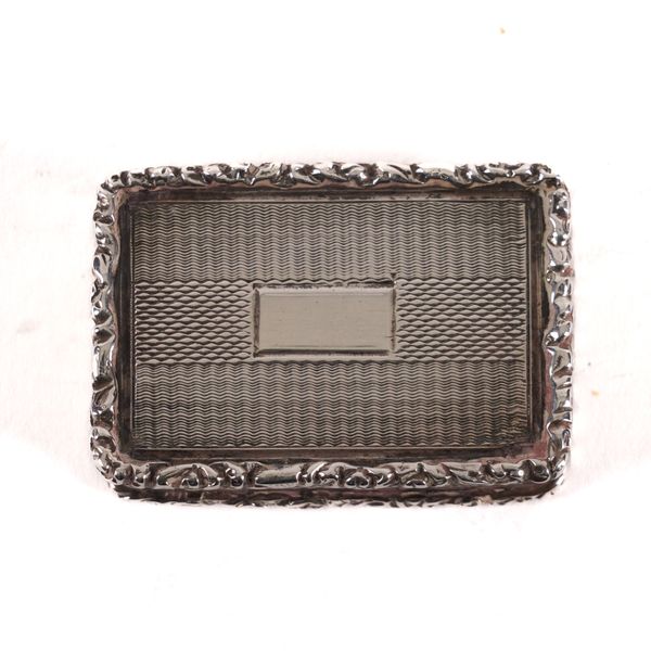 A SILVER RECTANGULAR VINAIGRETTE