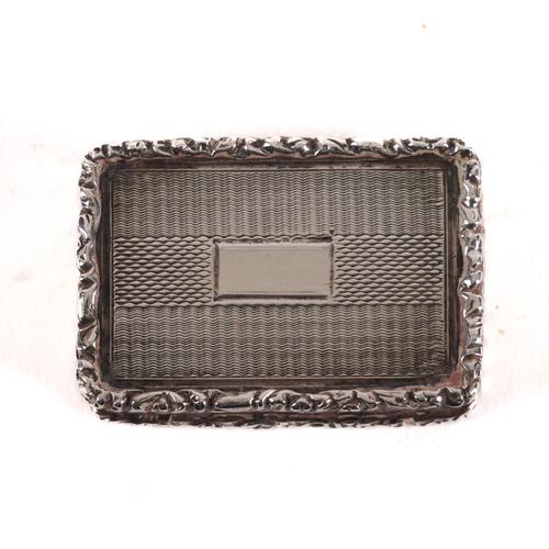 A SILVER RECTANGULAR VINAIGRETTE