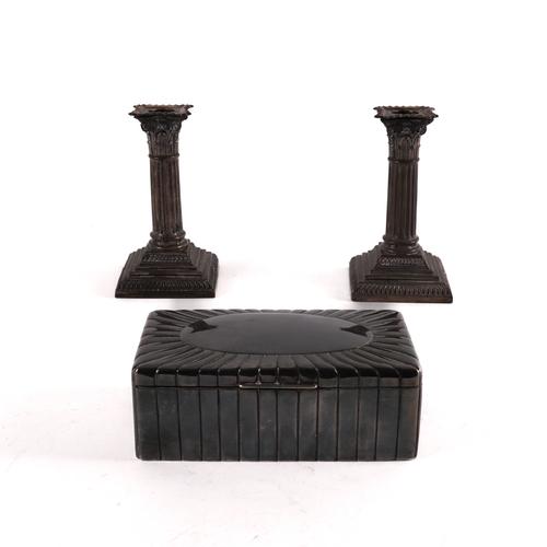 A EUROPEAN TABLE CIGARETTE BOX AND A PAIR OF SILVER CANDLESTICKS (3)