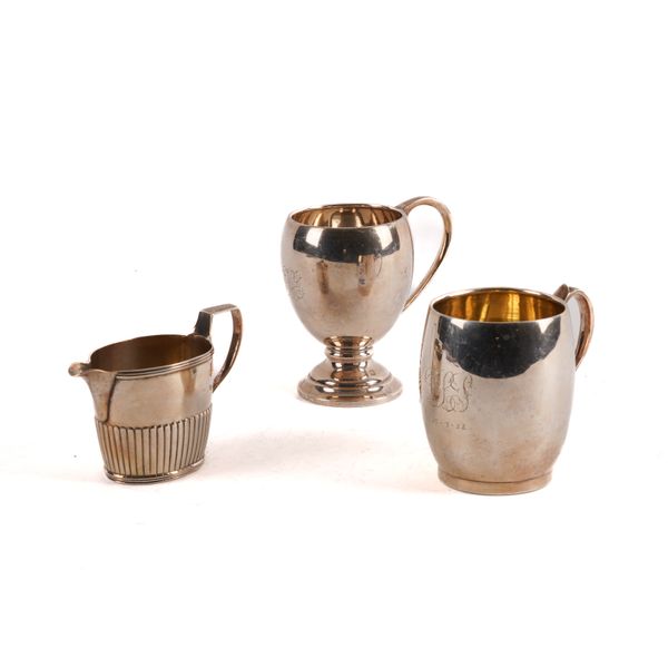 TWO SILVER CHRISTENING MUGS AND A SILVER CREAM JUG (3)