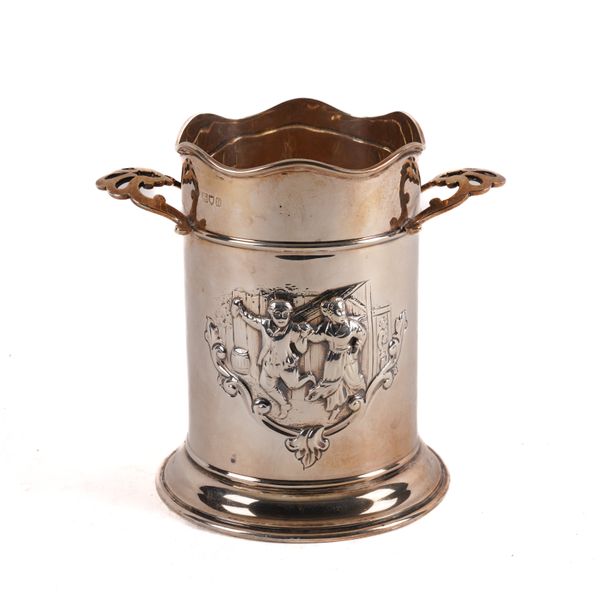 A SILVER TWIN HANDLED BOTTLE STAND