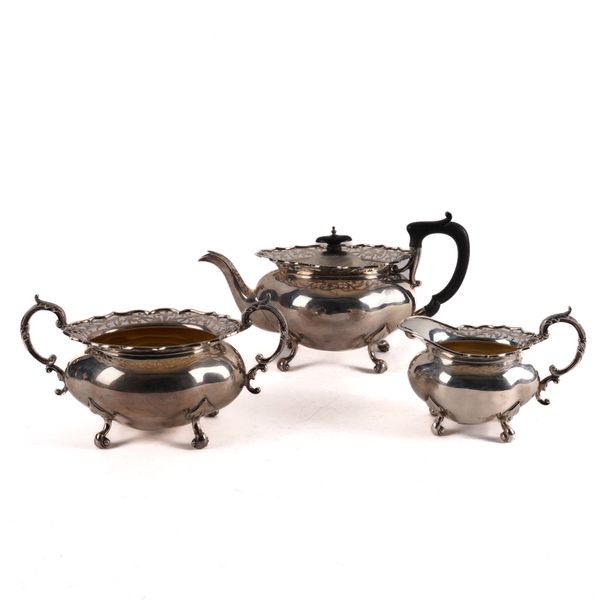 A SILVER THREE PIECE TEA SET