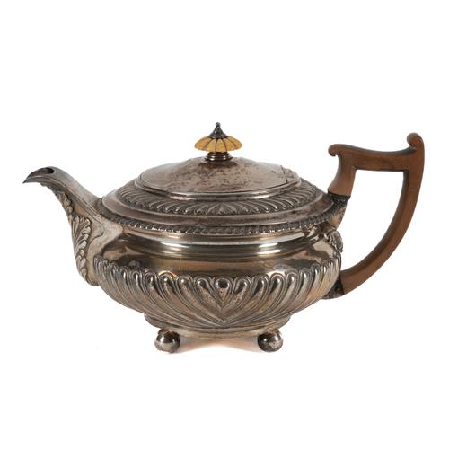 A GEORGE III SILVER TEAPOT