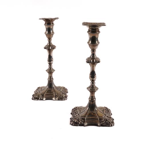 A PAIR OF LATE GEORGE II CAST SILVER TABLE CANDLESTICKS (2)