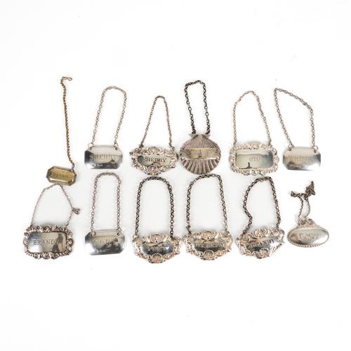 NINE SILVER DECANTER LABELS AND THREE FURTHER (12)