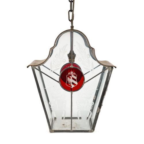 A COPPER MOUNTED ETCHED GLASS LANTERN WITH STAINED GLASS MEDALLION