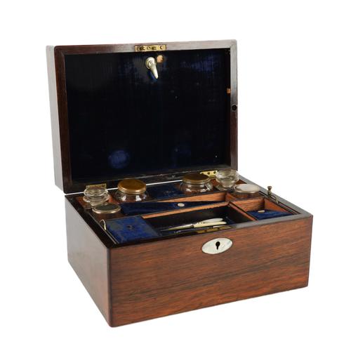 A VICTORIAN ROSEWOOD MOTHER-OF-PEARL INLAID TOILET BOX