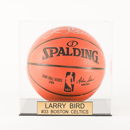 SPORTING MEMORABILIA: A SIGNED BASKETBALL FOR LARRY BIRD