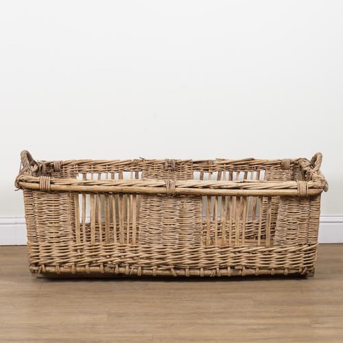 A LARGE FRENCH TWIN HANDLE WICKER BASKET