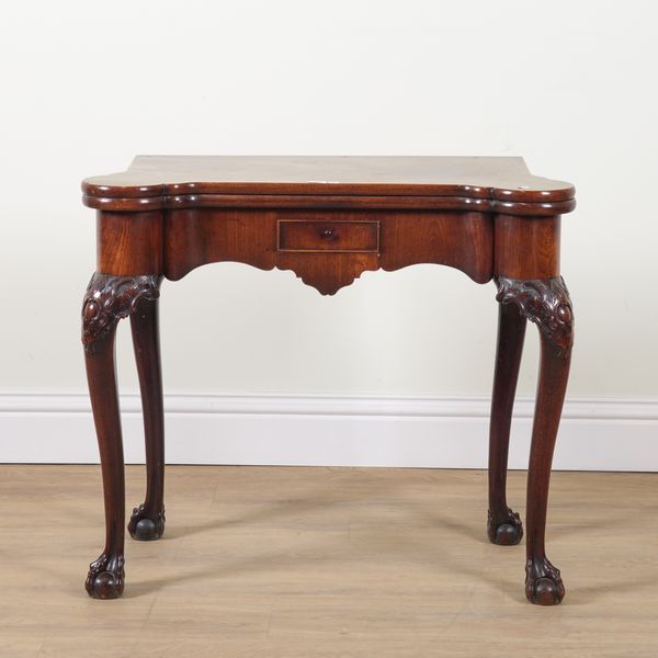 A LATE GEORGE II MAHOGANY FOLDOVER CARD TABLE