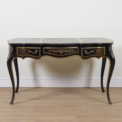 DREXEL; A LOUIS XV STYLE FIGURED OAK GILT METAL MOUNTED AND EBONISED CENTRE WRITING DESK