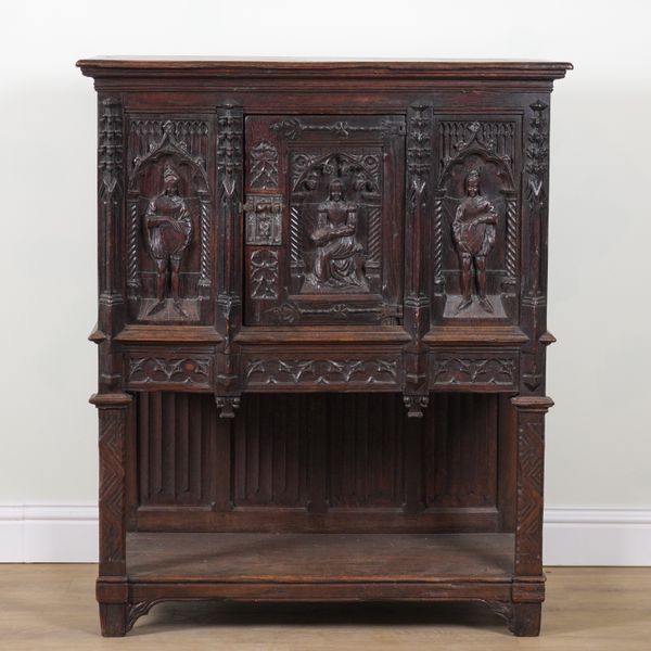 A 17TH CENTURY STYLE OAK CABINET ON STAND
