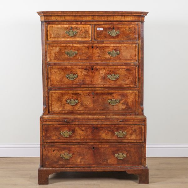 A GEORGE I FIGURED WALNUT CHEST ON CHEST