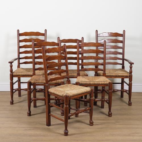 A SET OF SIX OAK LADDER BACK DINING CHAIRS (6)