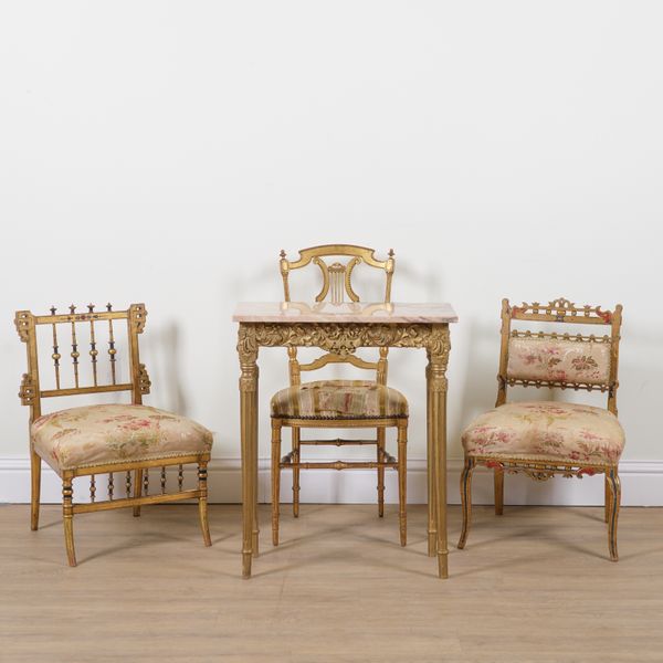 A GROUP OF THREE GOLD PAINTED LOW SALON CHAIRS (4)