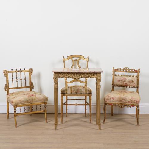 A GROUP OF THREE GOLD PAINTED LOW SALON CHAIRS (4)