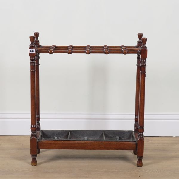 A 19TH CENTURY MAHOGANY TWELVE DIVISION STICK STAND