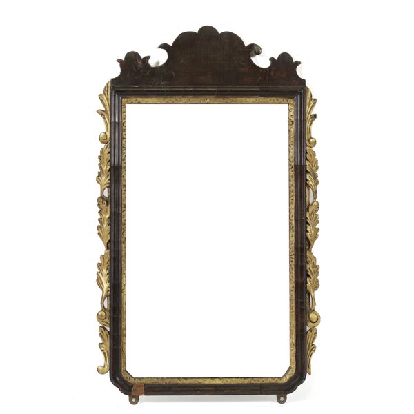 A MID 18TH CENTURY PARCEL GILT FRET CARVED MAHOGANY WALL MIRROR
