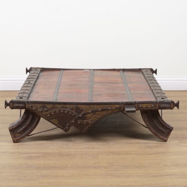 AN INDIAN HARDWOOD METAL BOUND COFFEE TABLE