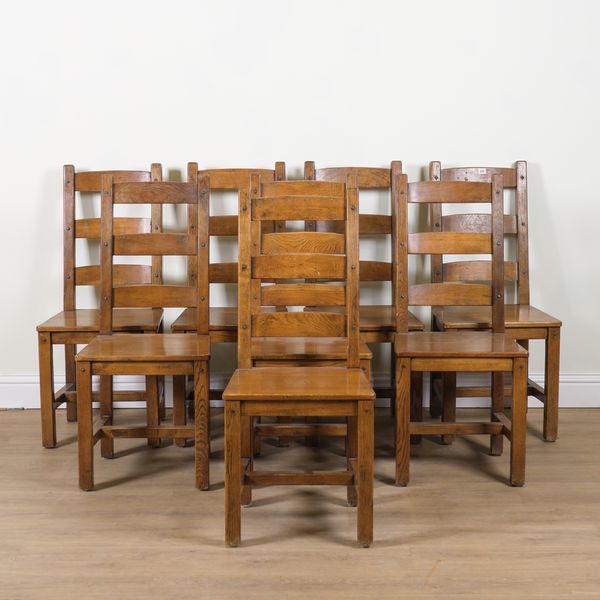 A SET OF EIGHT 20TH CENTURY OAK LADDERBACK DINING CHAIRS (8)