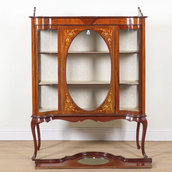 AN EDWARDIAN POLYCHROME DECORATED INLAID MAHOGANY SERPENTINE DISPLAY CABINET