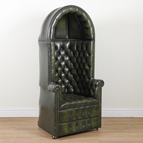 A GEORGE III STYLE GREEN LEATHER BUTTONBACK UPHOLSTERED DOME TOP PORTER'S CHAIR
