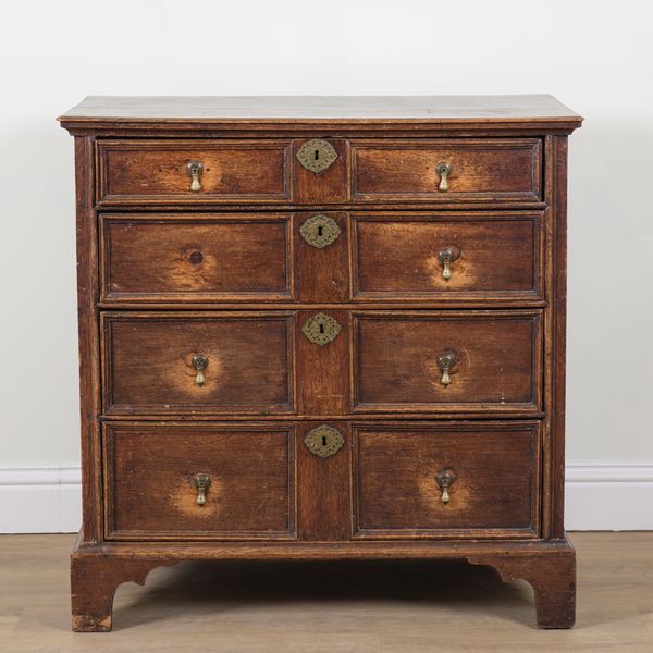 A CHARLES II OAK CHEST OF DRAWERS