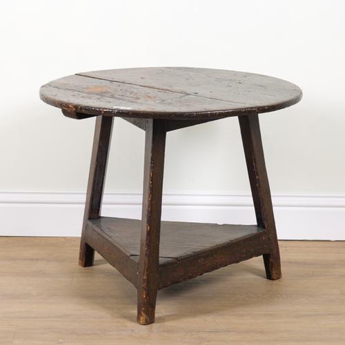 A 19TH CENTURY STAINED PINE CRICKET TABLE