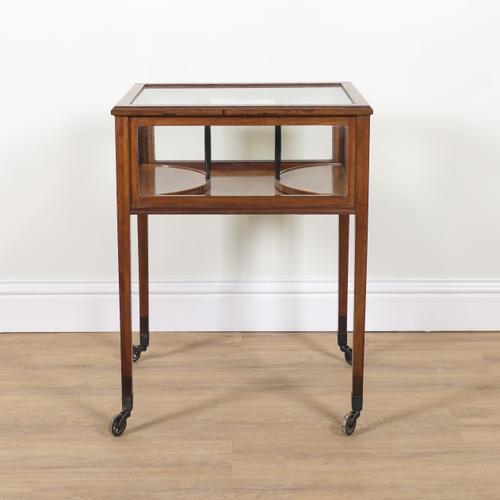 AN EARLY 20TH CENTURY FRENCH MAHOGANY FRAMED BIJOUTERIE TABLE