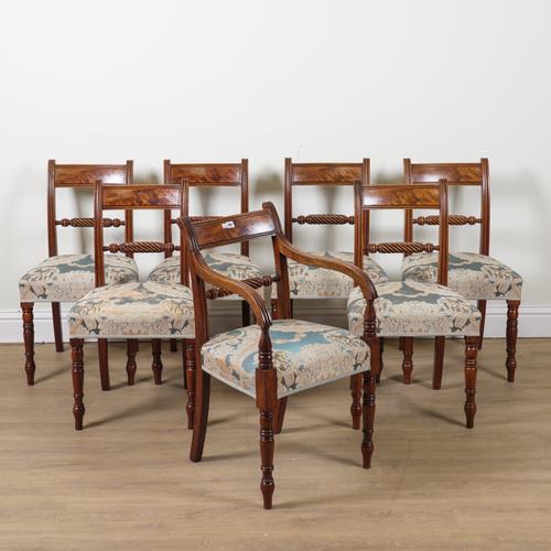 A SET OF SEVEN GEORGE IV MAHOGANY BAR BACK DINING CHAIRS (7)