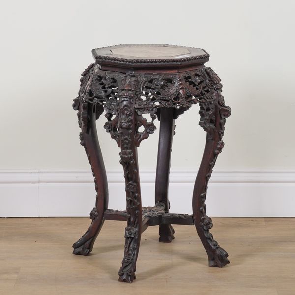 A CHINESE EXPORT CARVED HARDWOOD INSET MARBLE TOPPED OCCASIONAL TABLE