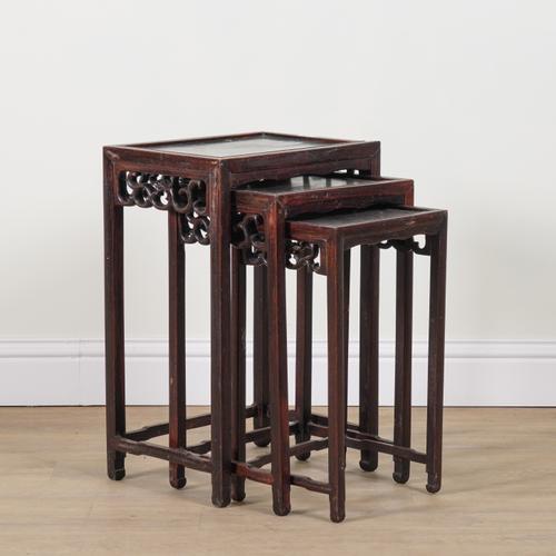 AN EARLY 20TH CENTURY CHINESE EXPORT HARDWOOD NEST OF THREE TABLES